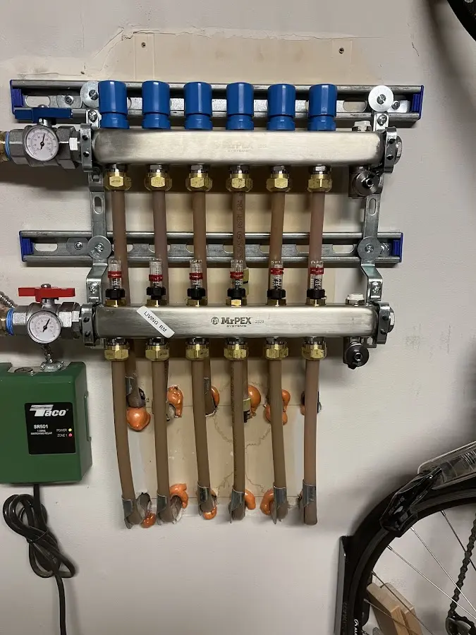 Plumber performing Gas Line Installation at a residential property in Essex